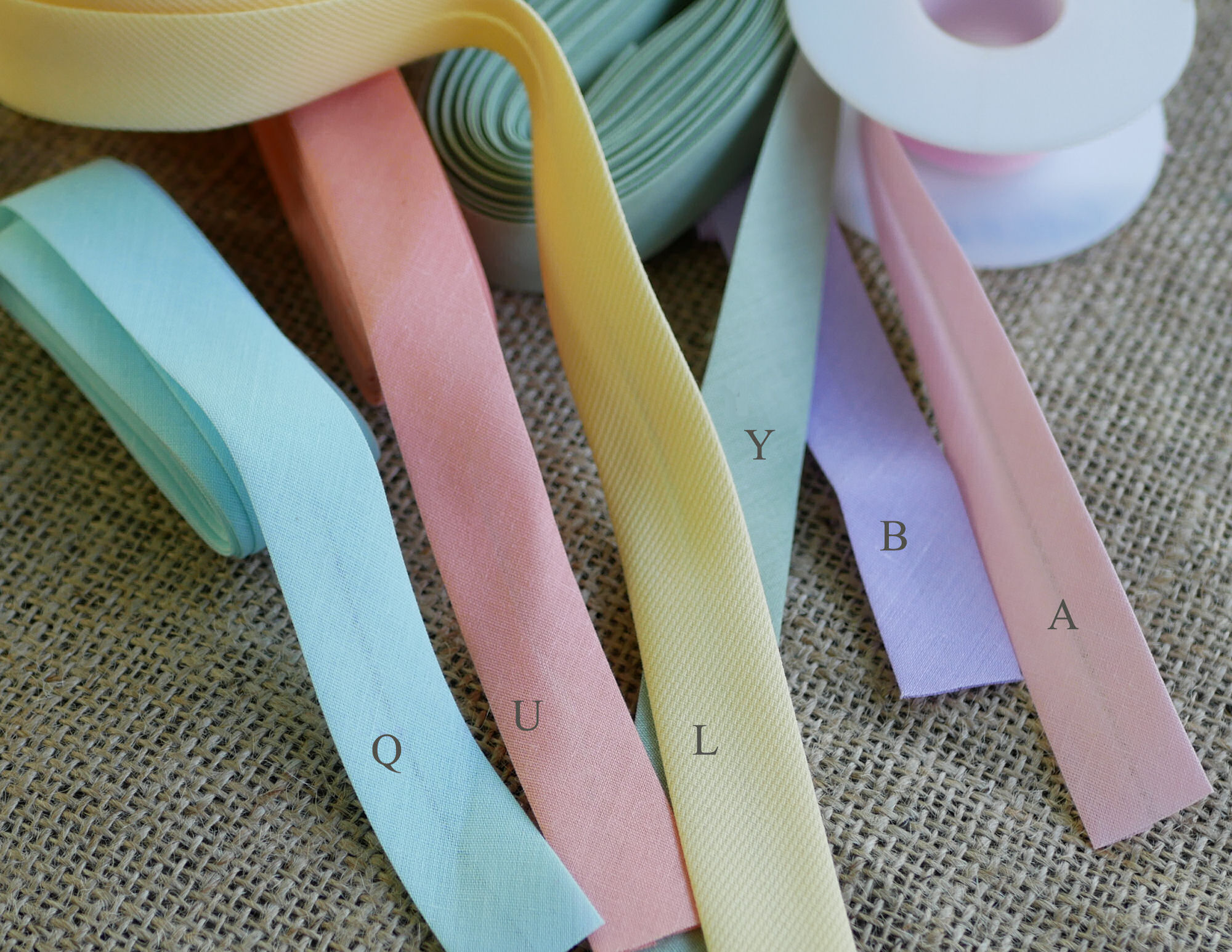 tecidos pastel para laços de noiva